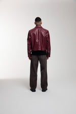 Trace Cut Denim Jeans in Chocolate Brown worn by male model