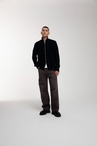 Engineered Zip Cardigan in Black worn by male model