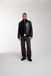 Boxy Hiker Leather Jacket in black worn by male model