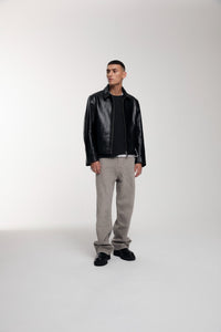 Trace Cut Denim Jeans in Vintage Khaki worn by male model