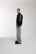 Trace Cut Denim Jeans in Vintage Khaki worn by male model