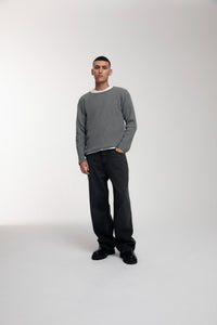 Trace Cut Denim Jeans in Meteorite Black worn by male model