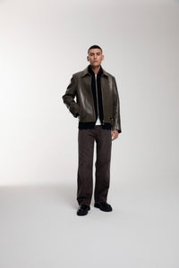 Boxy Hiker Leather Jacket in green worn by male model