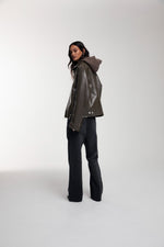 Boxy Hiker Leather Jacket in green worn by female model