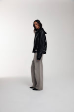 Boxy Hiker Leather Jacket in black worn by female model