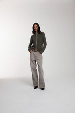 Engineered Zip Cardigan in Dusty Olive and Trace Cut Denim Jeans in Vintage Khaki worn by female model