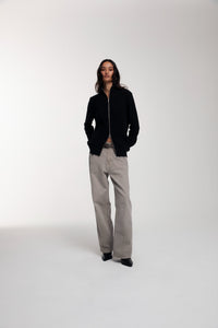 Engineered Zip Cardigan in Black worn by female model