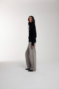 Engineered Zip Cardigan in Black worn by female model