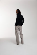 Engineered Zip Cardigan in Black worn by female model
