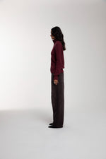 Engineered Zip Cardigan in Oxblood and Trace Cut Denim Jeans in Chocolate Brown worn by female model