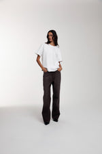 Trace T-Shirt in Optic White worn by female model