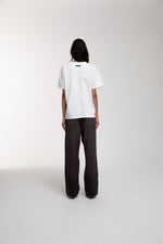 Trace T-Shirt in Optic White worn by female model