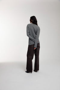 Thermal Trace Crewneck in Charcoal Grey worn by female model