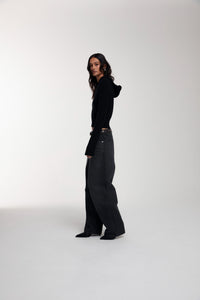 Trace Cut Denim Jeans in Meteorite Black worn by female model