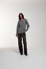 Thermal Trace Crewneck in Charcoal Grey worn by female model