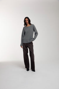 Thermal Trace Crewneck in Charcoal Grey worn by female model