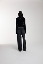Trace Cut Denim Jeans in Meteorite Black worn by female model
