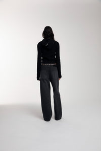 Trace Cut Denim Jeans in Meteorite Black worn by female model