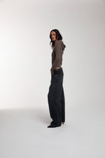 Frame Knitted Hoodie in Bungee Cord worn by female model