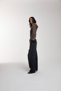 Frame Knitted Hoodie in Bungee Cord worn by female model