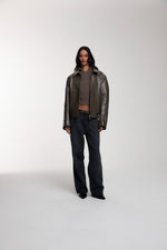 Boxy Hiker Leather Jacket in green worn by female model