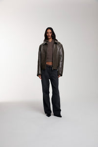 Boxy Hiker Leather Jacket in green worn by female model