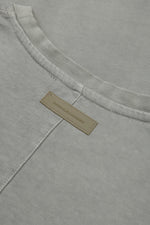 Trace T-Shirt in Foghorn — rubber logo patch detail